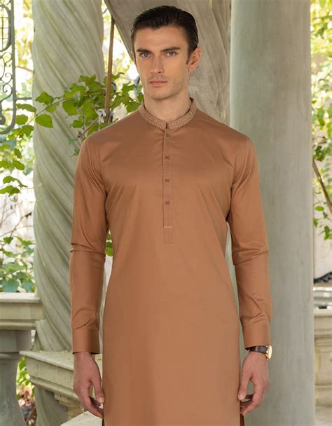 light brown shalwar kameez.